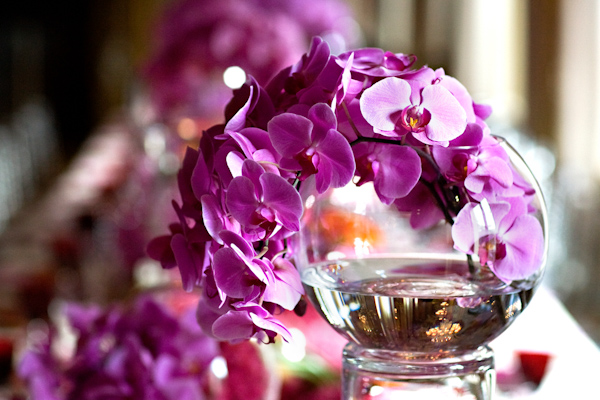 wedding photo by Bob and Dawn Davis Photography, beautiful pink orchid centerpiece
